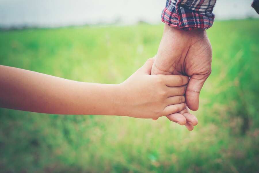 father-holding-his-daughter-hand